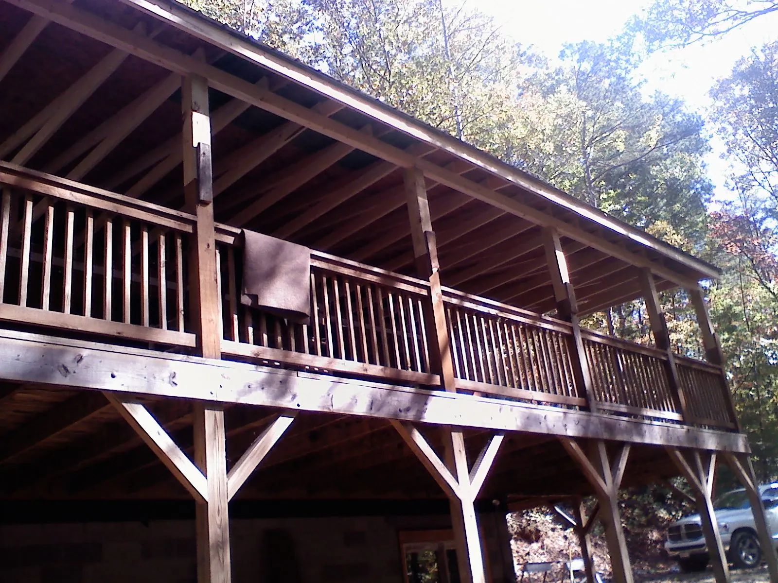 Timber framing under a new elevated porch and deck — Roof Leak Repair in Una by Roofing Brothers
